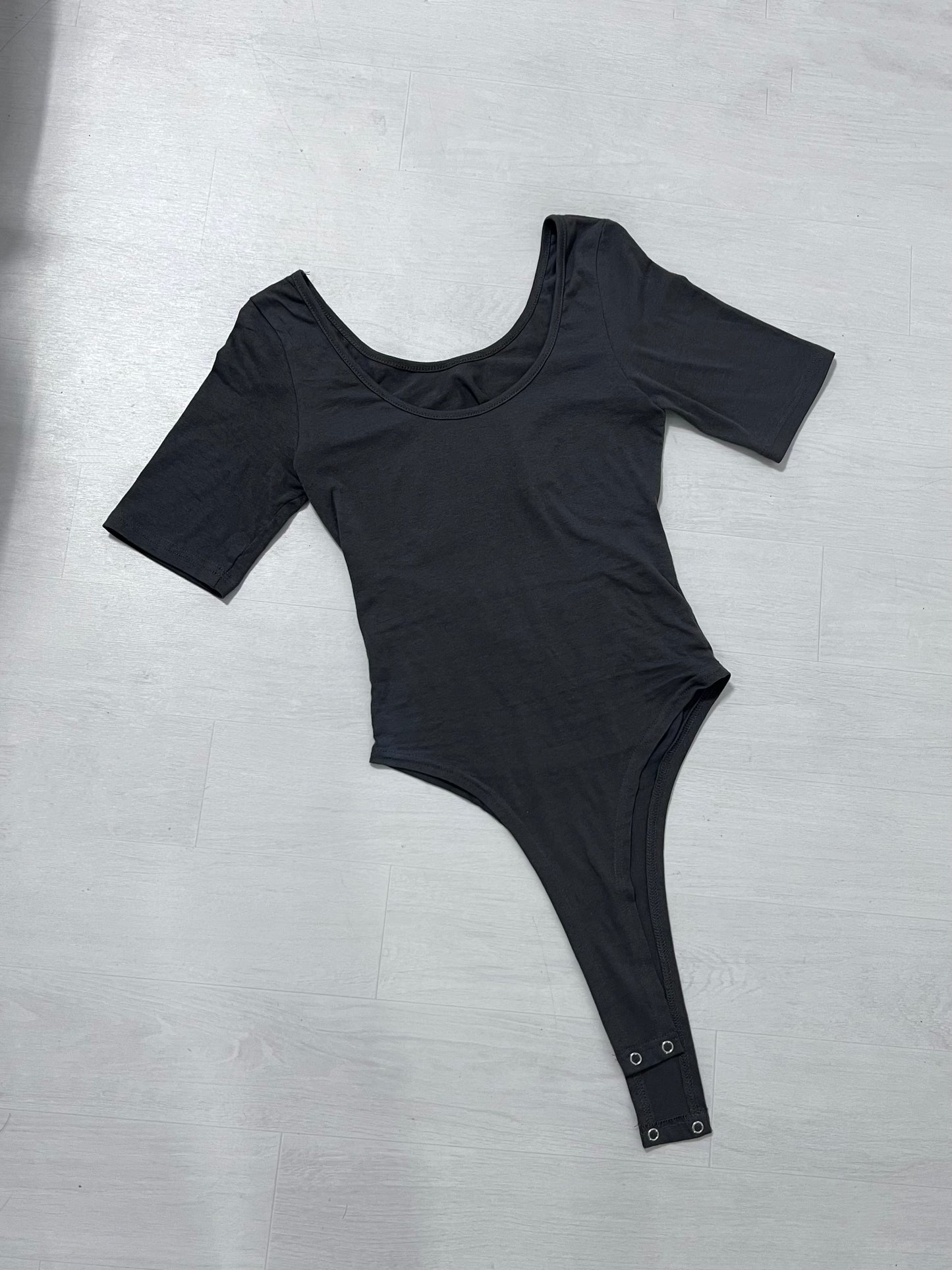 ‘GO BABY’ body suit